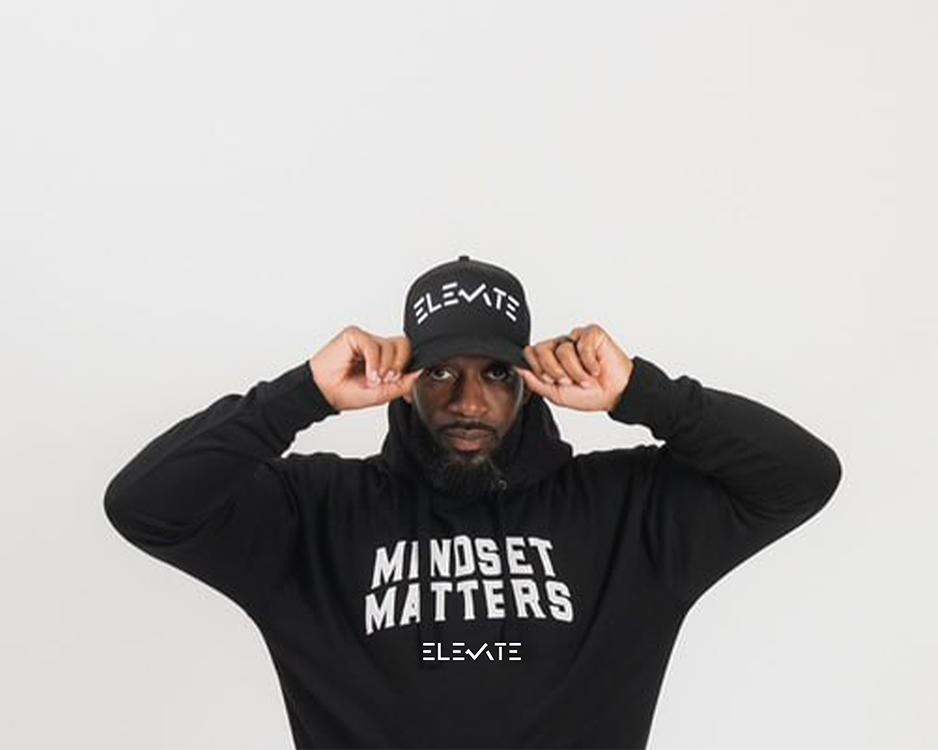 Person wearing a black hoodie with 'MINDSET MATTERS' text on a white background